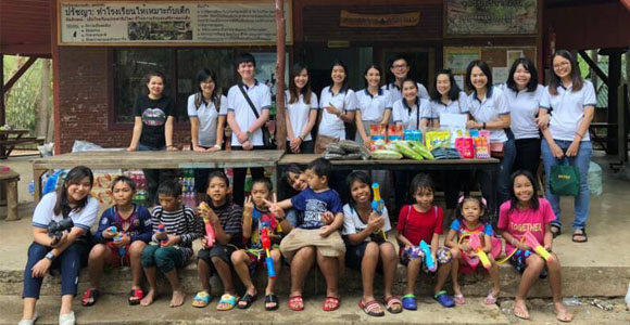 Employees in Thailand help local school