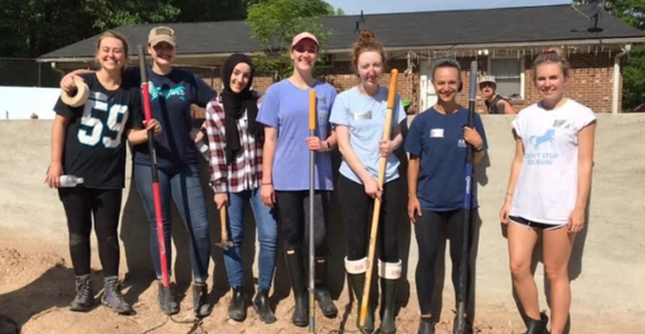 Interns dig in to help local community